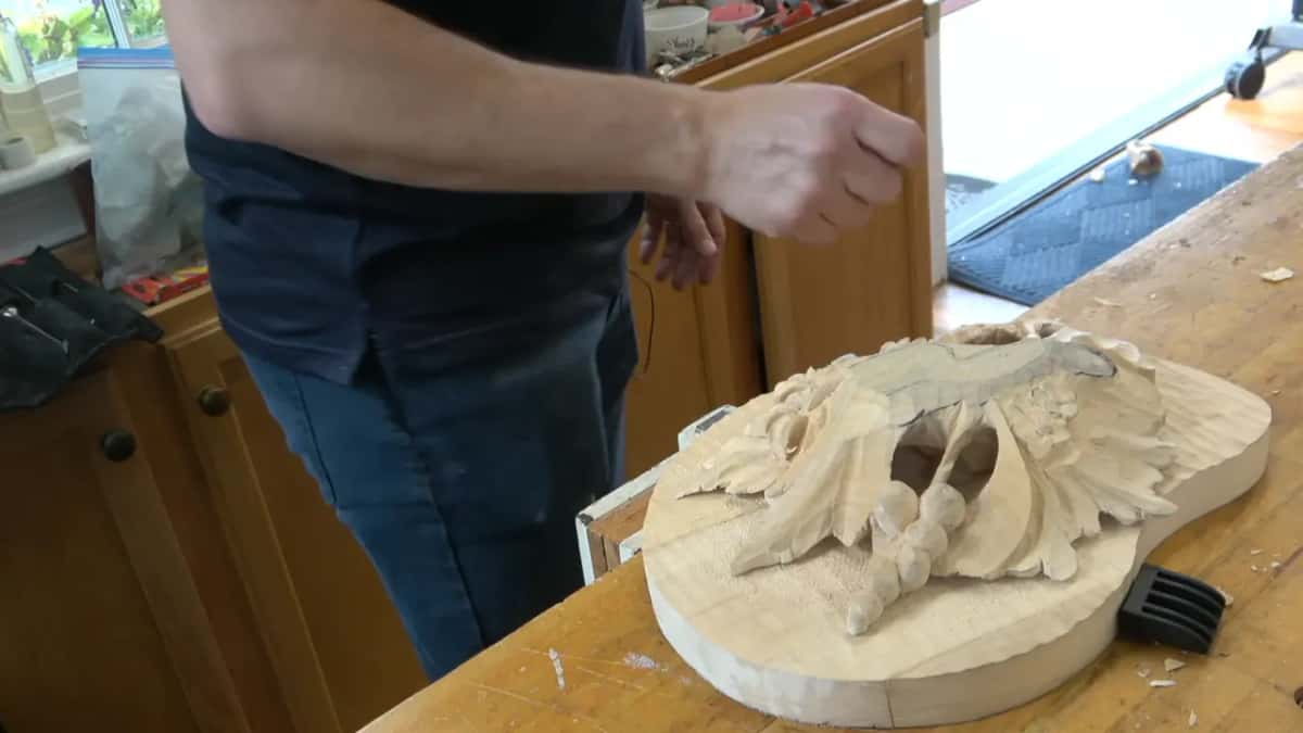 Carved layer set down on its ground