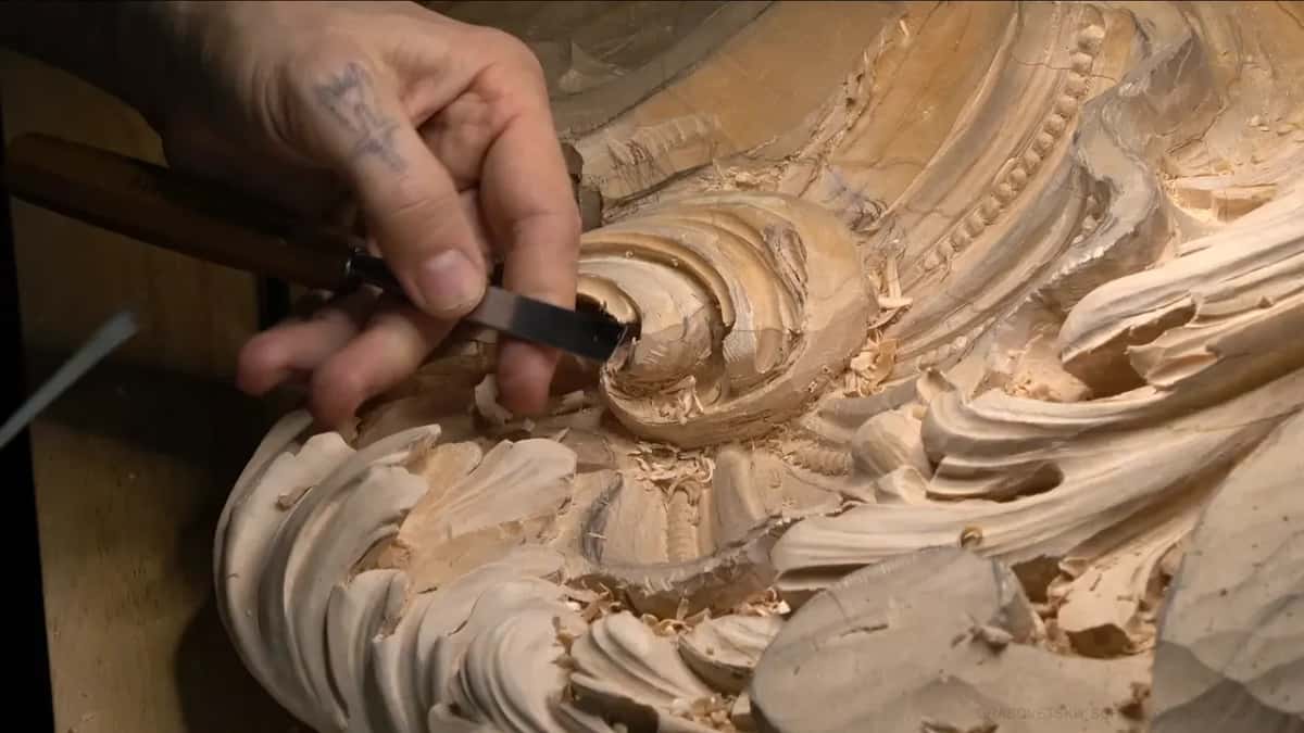 A number two in Europe Flat gouge with a dark blade working the surface of the head
