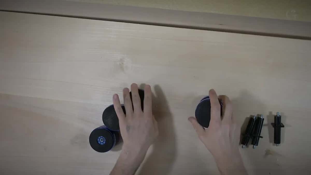 Cookies and legs Bench cookies and their metal extension legs laid out on the bare board before any sawing starts