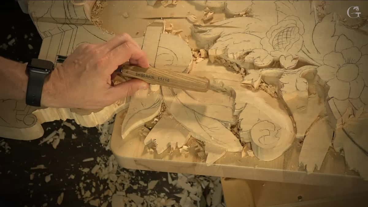 Gouge held low along the outline.