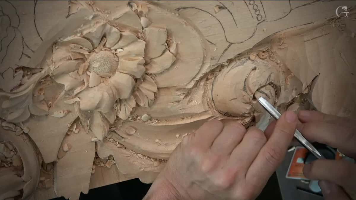 Slim gouge near the scroll eye