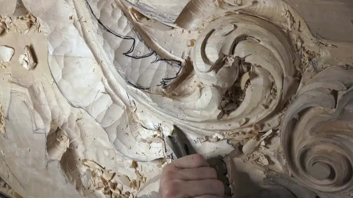 Heaps of chips around a wide gouge low on the leaf.