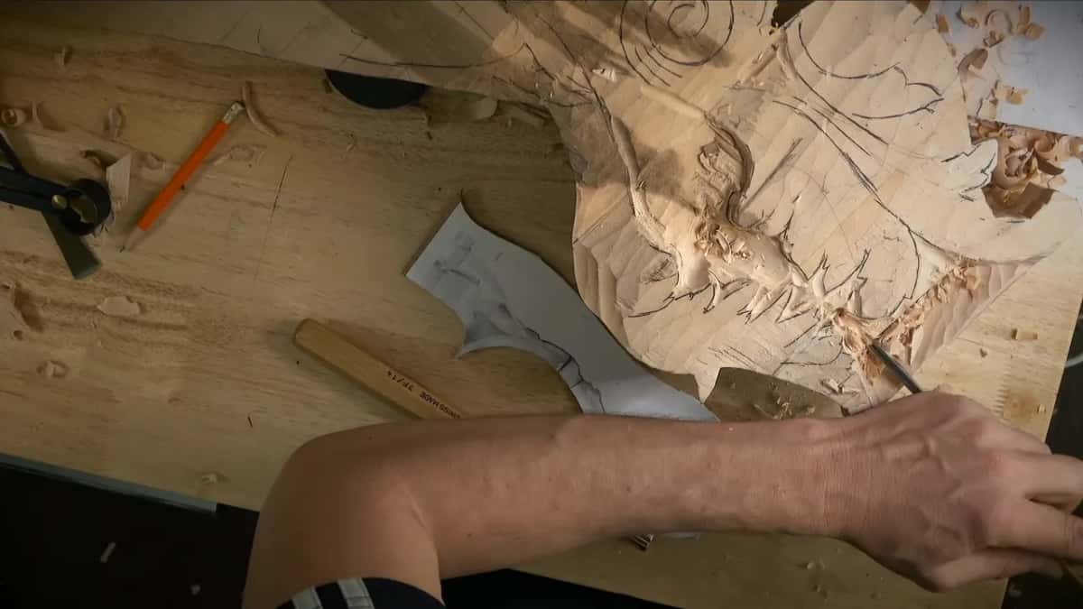 Almost Forearm across the bench, calipers top left, a small tool at the leaf