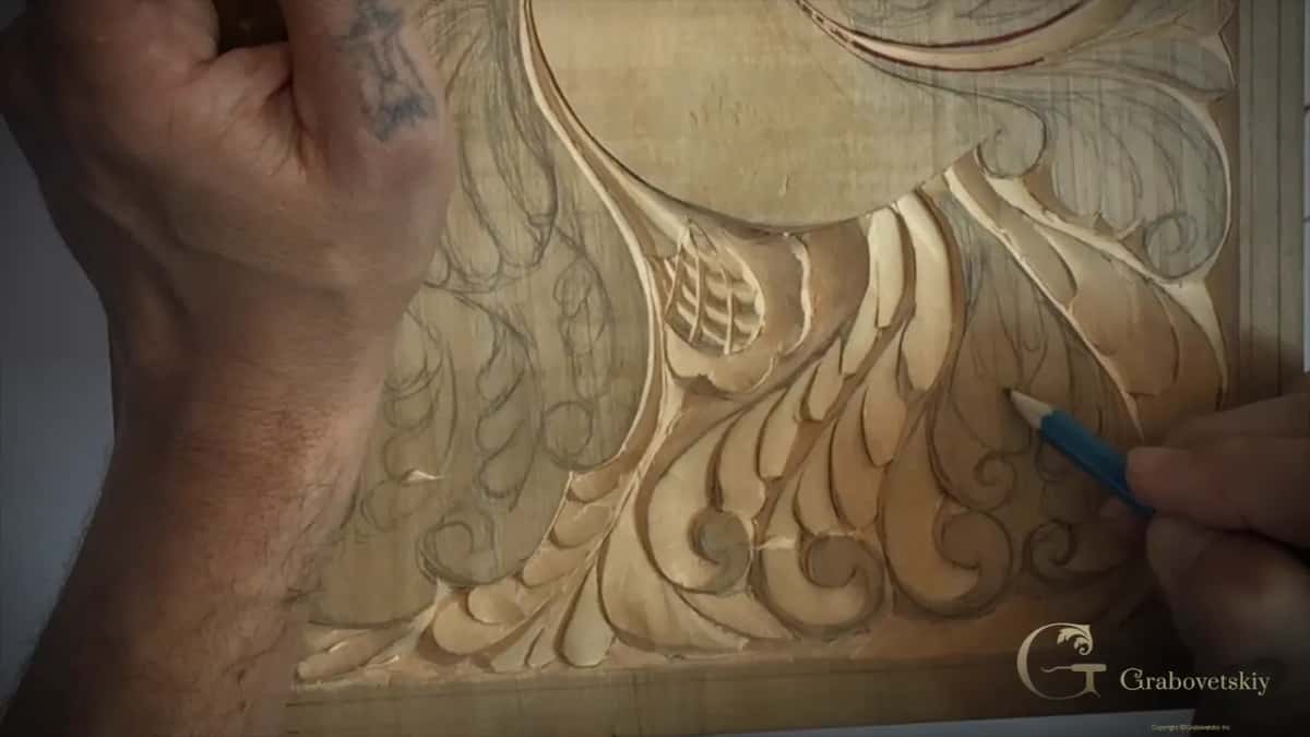 Pencil back on the tail, marking a small volute that never appeared in the original drawing.