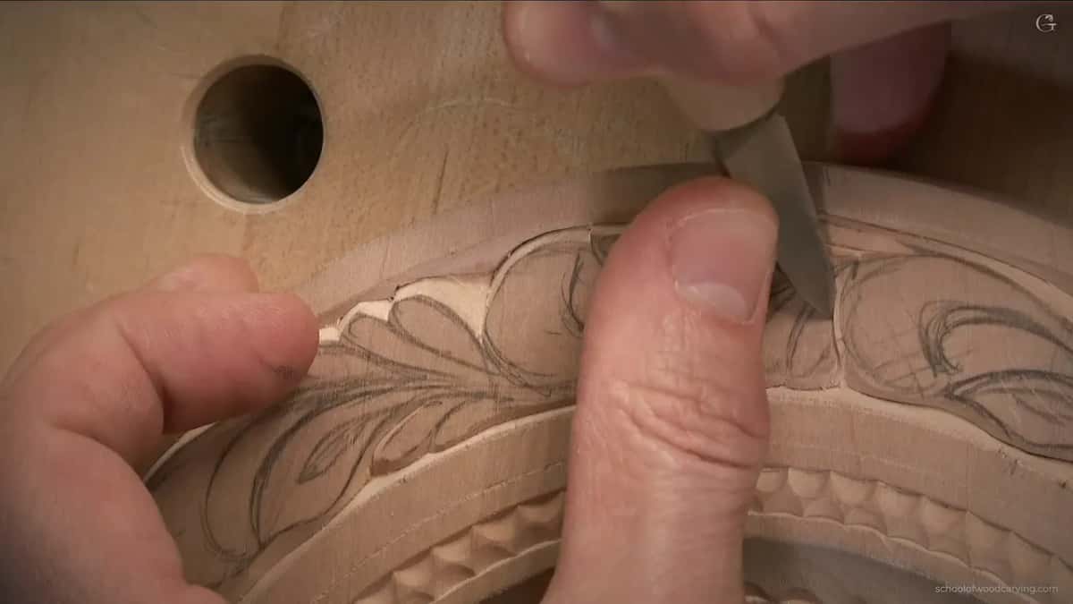 Knife tip on the penciled rim leaves.