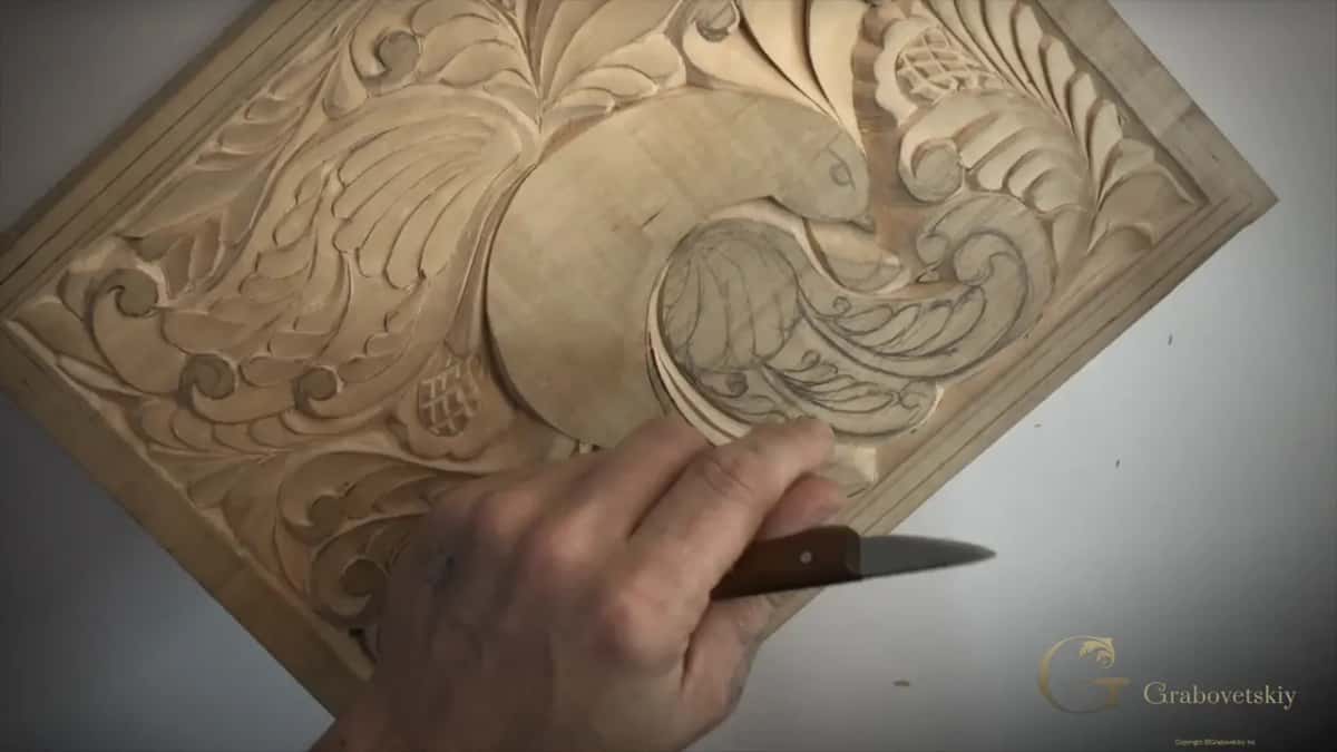 Half of this bird is carved and the rest is still drawing, with only a knife used so far on any of it.
