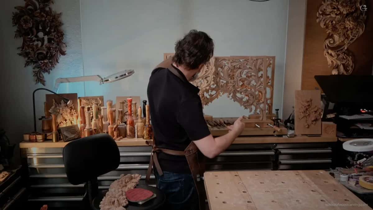 Pierced organ panel stands upright on the bench