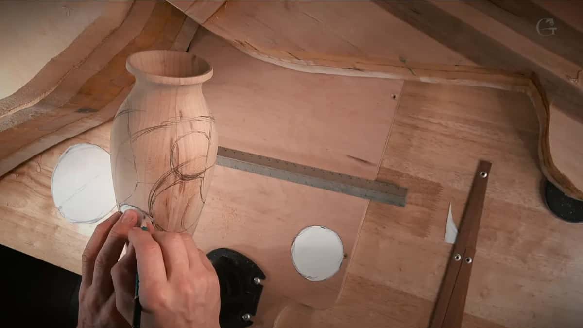 Loose pencil curves of the vine running over and under the traced circles, with paper discs on the bench