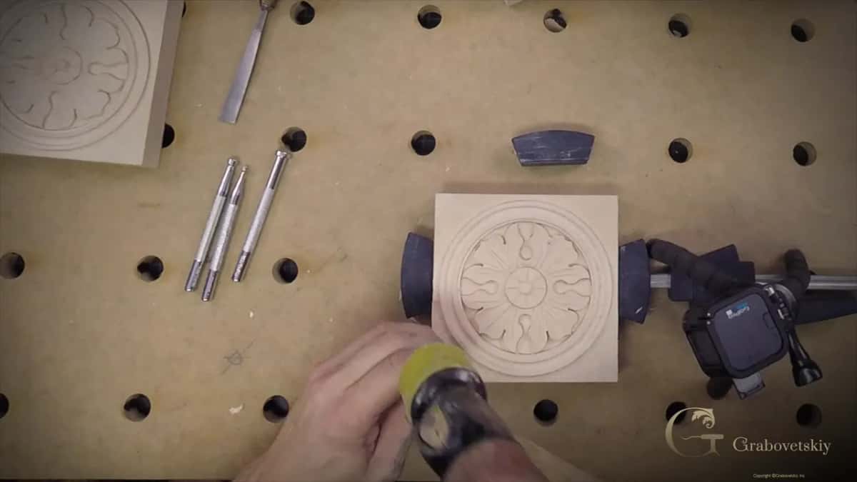 Yellow mallet face on the punch.