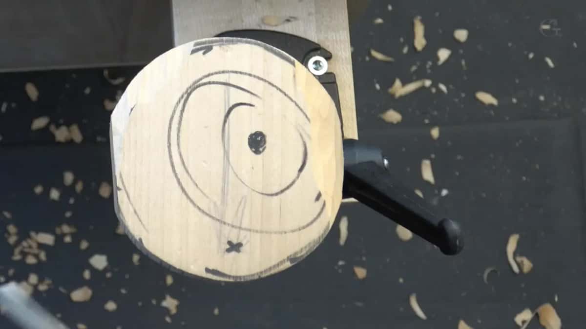 Round blank in a clamp