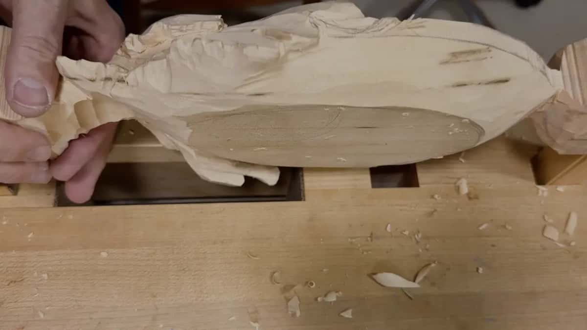Tray tipped up off the bench to show its flat oval bottom