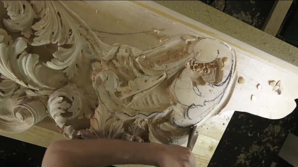 Ink lines still mark the block of wood waiting at the end of the section, an arm reaching in from below