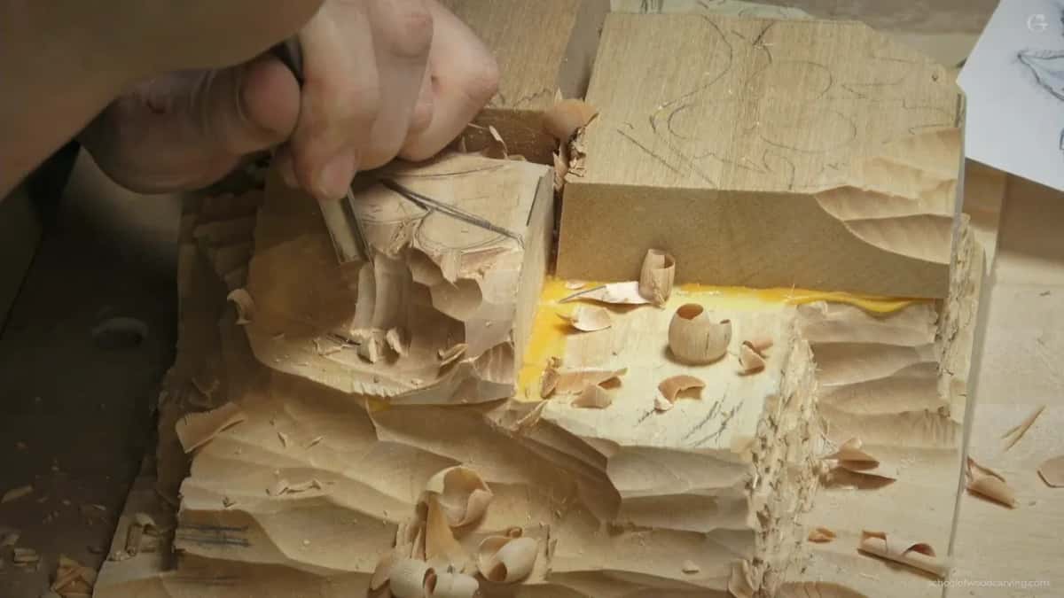 Held upright, a gouge pressed straight into the top