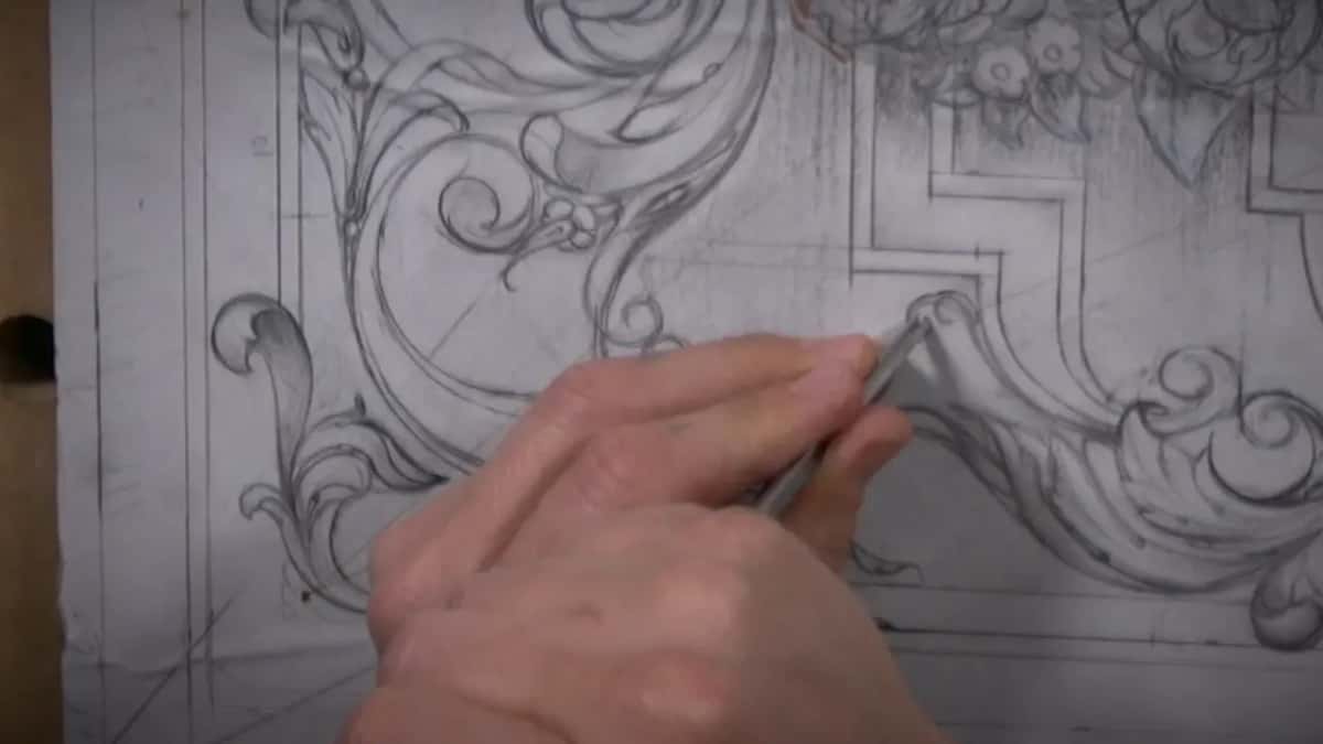 Knife tip tracing an outline.
