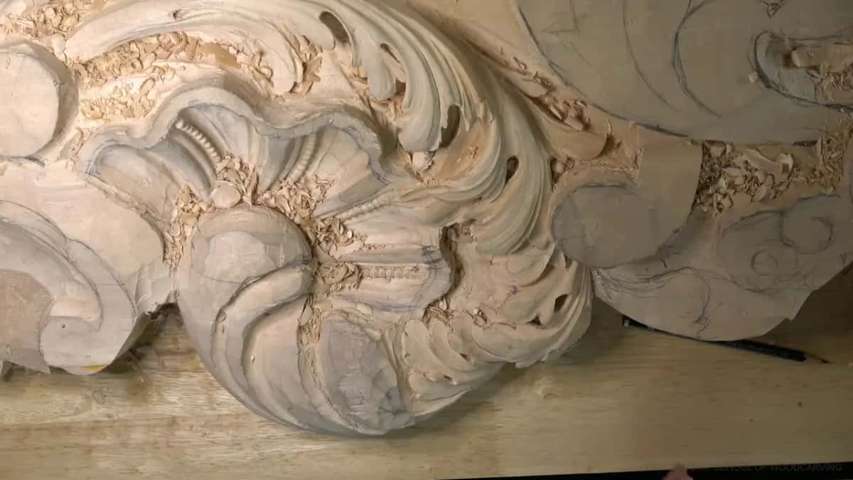 Gouge marks left all over a big acanthus scroll, no hands in the shot