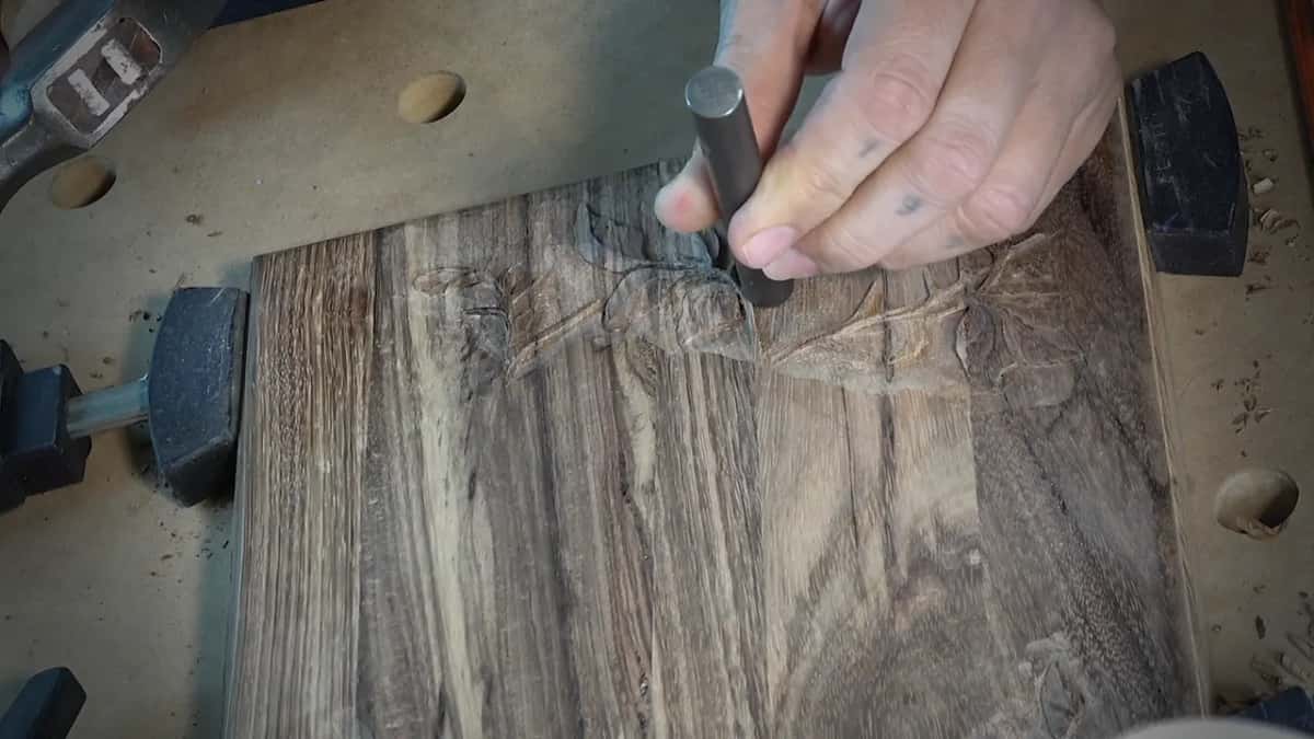 Punch upright near the carved design