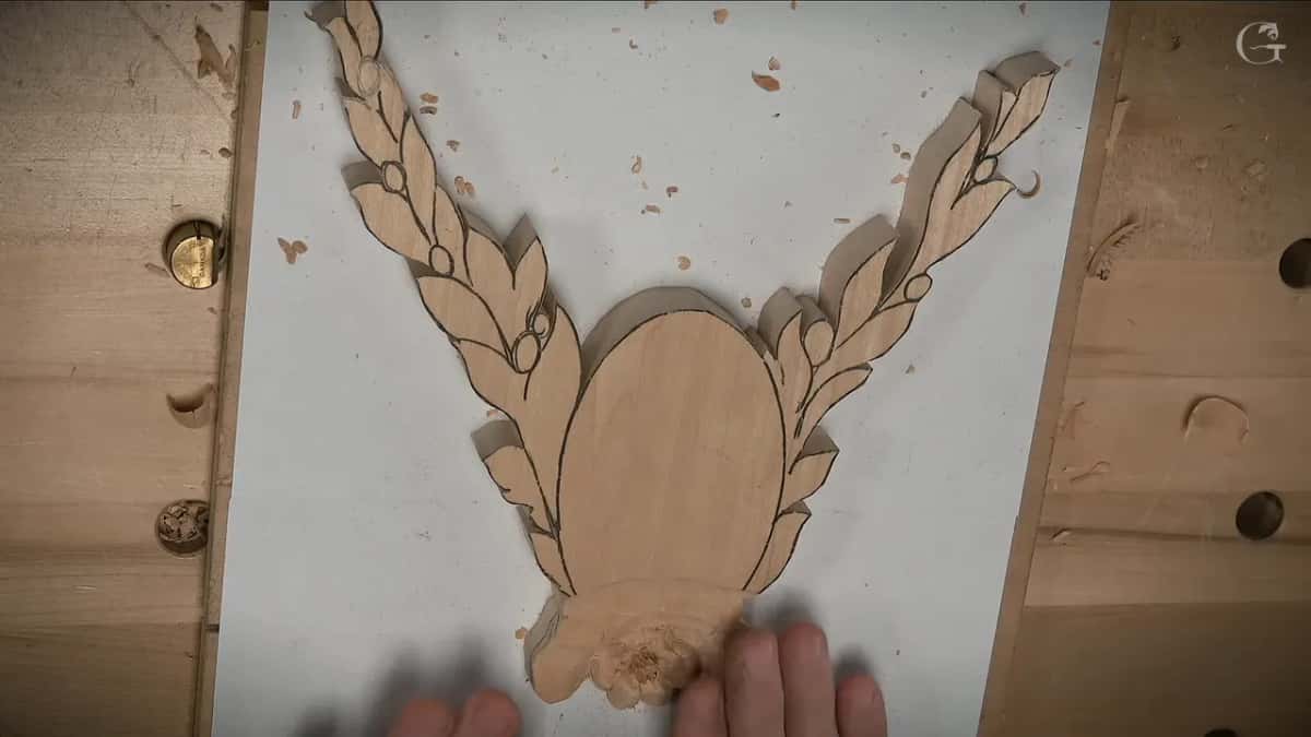 Seen from above, two drawn leaf sprays rise from a plain oval, with the small flower at its foot