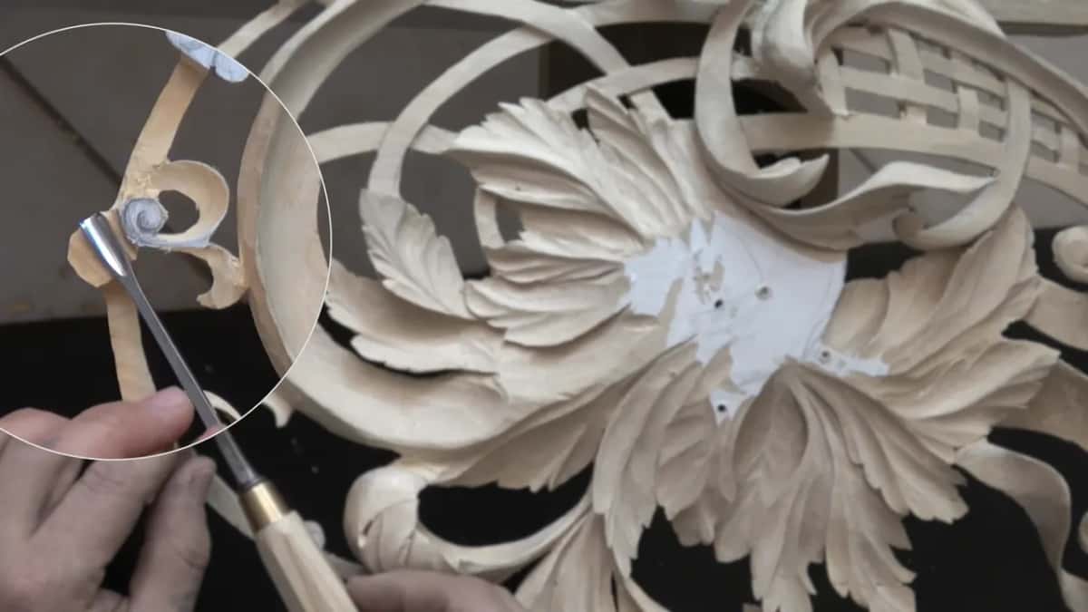 Inside a magnified circle, a gouge curls a shaving from a ribbon.