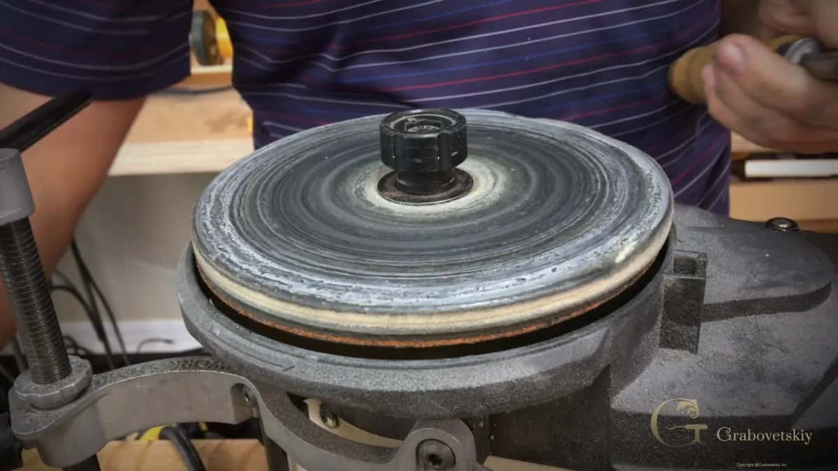 Worn grey wheel, one gouge behind it.