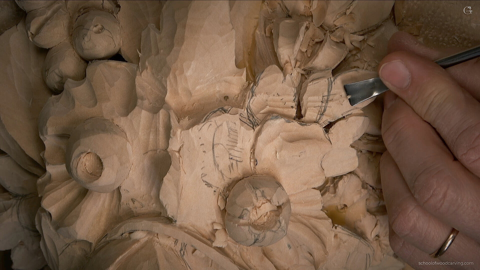 Is wood carving a lucrative profession? Alexander Grabovetskiy proofs in this image of Carving process of Grinling Gibbons style of Wood Carving. He carves Flowers and Foliage Rosette. Learn the art of wood carving with Wood Carving School! Get step-by-step instruction from professional woodcarvers as you explore the basics of wood carving in our wood carving classes. Whether you want to learn the basics of wood carving or hone your skills with a wood carving masterclass, we have the lesson for you. With our wood carving lessons, courses, workshops and videos, you can discover if it is possible to make money carving wood. Start learning with Wood Carving School today!