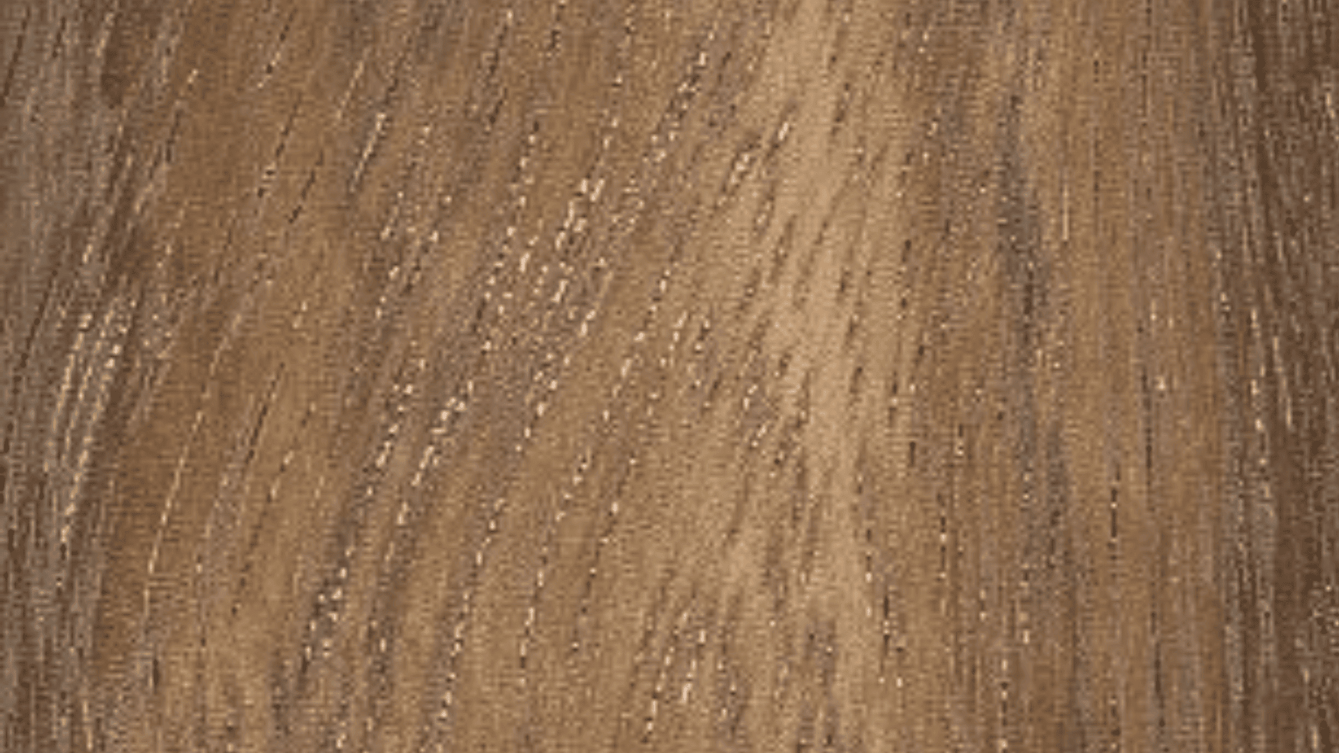 WOODCARVING LESSONS: Close-up of a wooden surface showing wood grain with shades of brown and light texture. Woodcarver Grabovetskiy's work on display. - Wood Carving tutorials